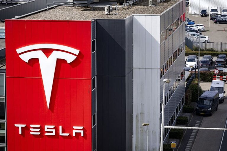 Business news live: ftse 100 rises and tesla poised to