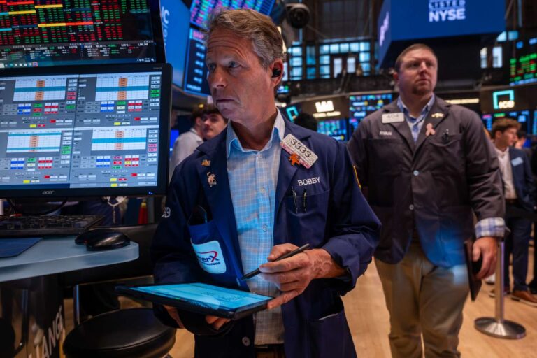 Stocks close little changed after fed holds rates steady as