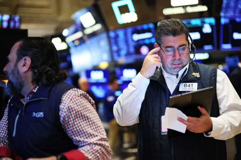 Stocks surge to wrap up a wild week; s&p 500