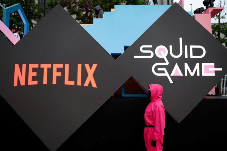 Netflix earnings top estimates but stock slips on 'elevated expectations'