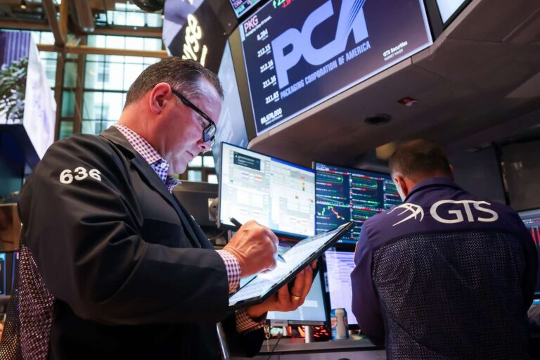 Dow retreats from record as stocks slide after friday's big