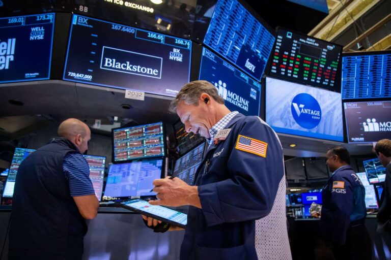 Nasdaq closes at record high as apple leads tech stock