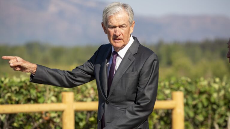 Powell indicates conditions 'may warrant' interest rate cuts as fed