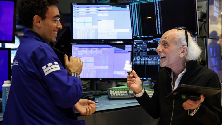 Stock futures are little changed after dow's record close, as