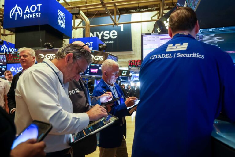 Stocks tumble as investors react to weak jobs report, latest