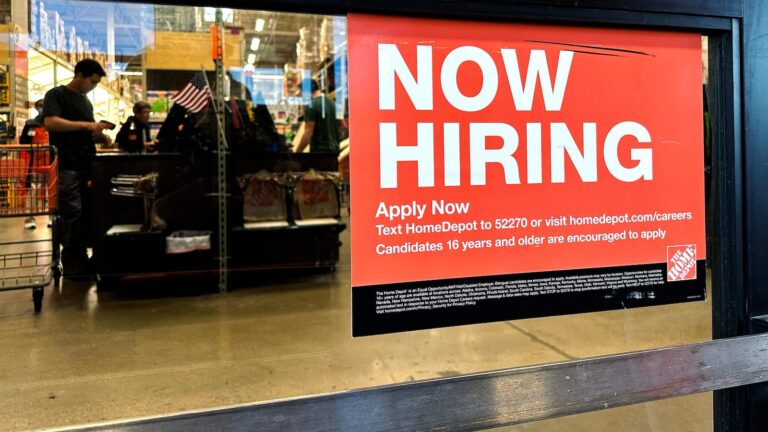 Us applications for jobless benefits up modestly but remain at